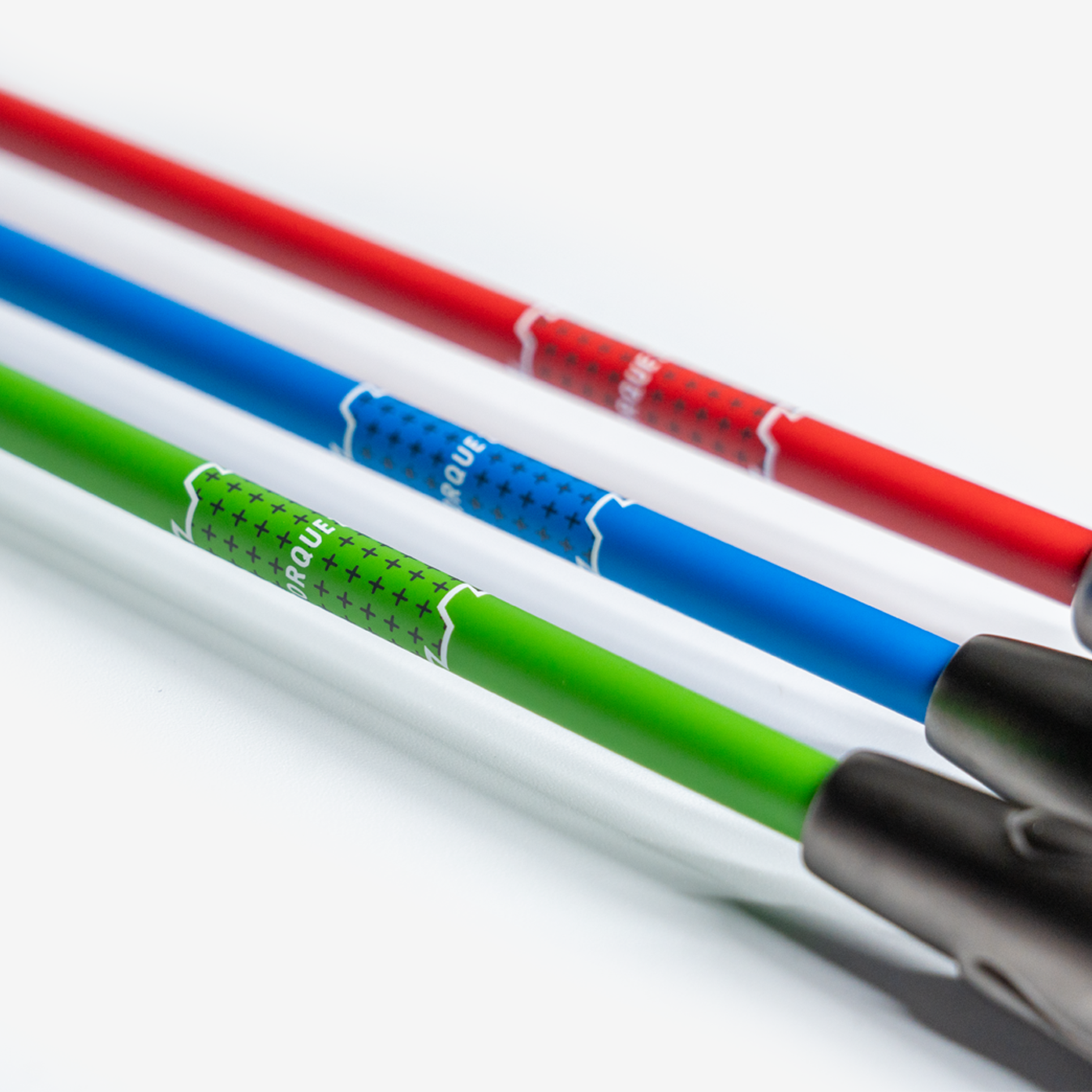 close up of the super speed stick shafts in green, blue, and red