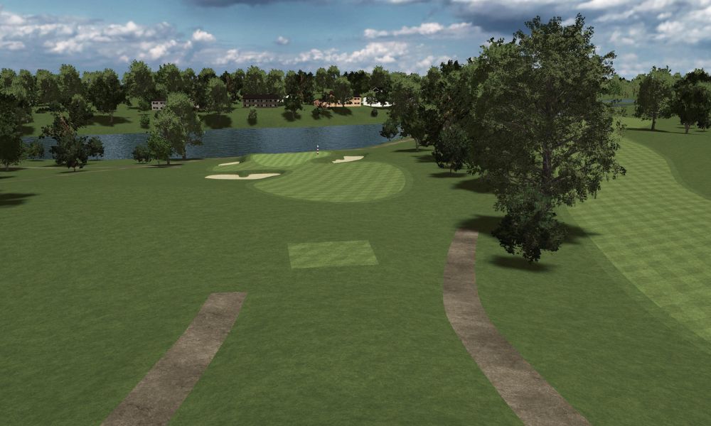 Golf course with green fairway, sand bunkers, and trees under a blue sky.