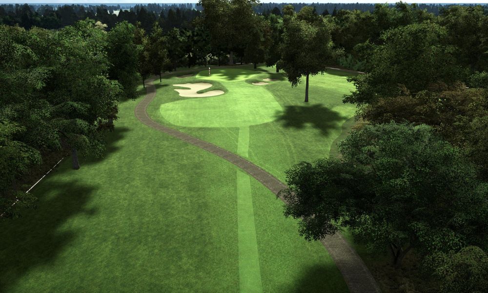 Golf course with green fairways and trees