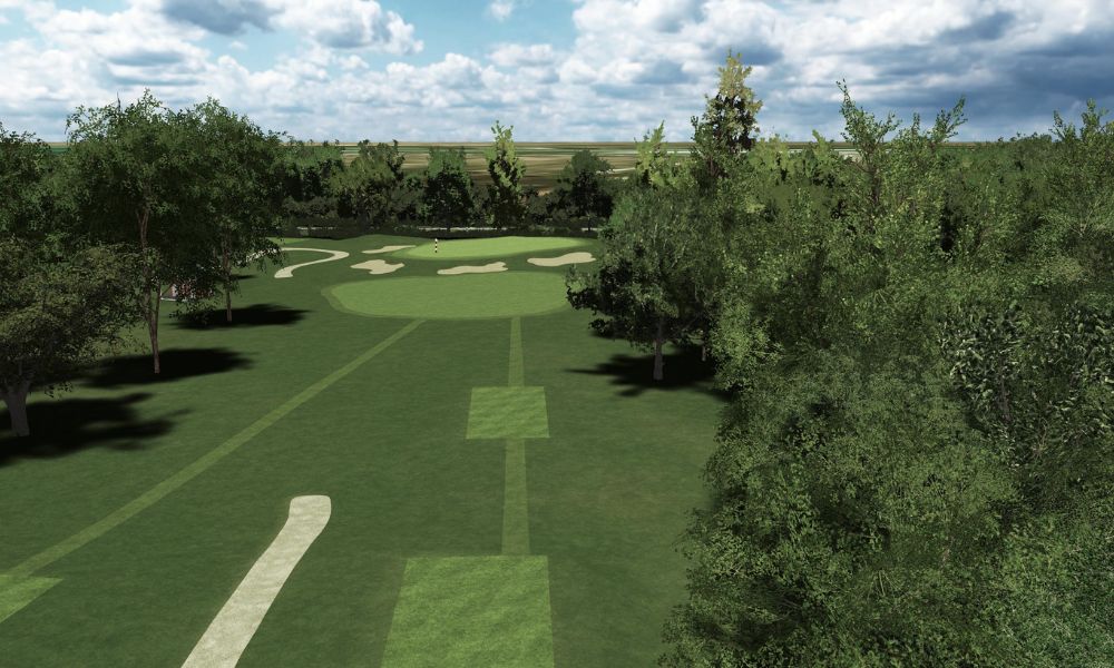 Golf course with green grass and trees under a cloudy sky