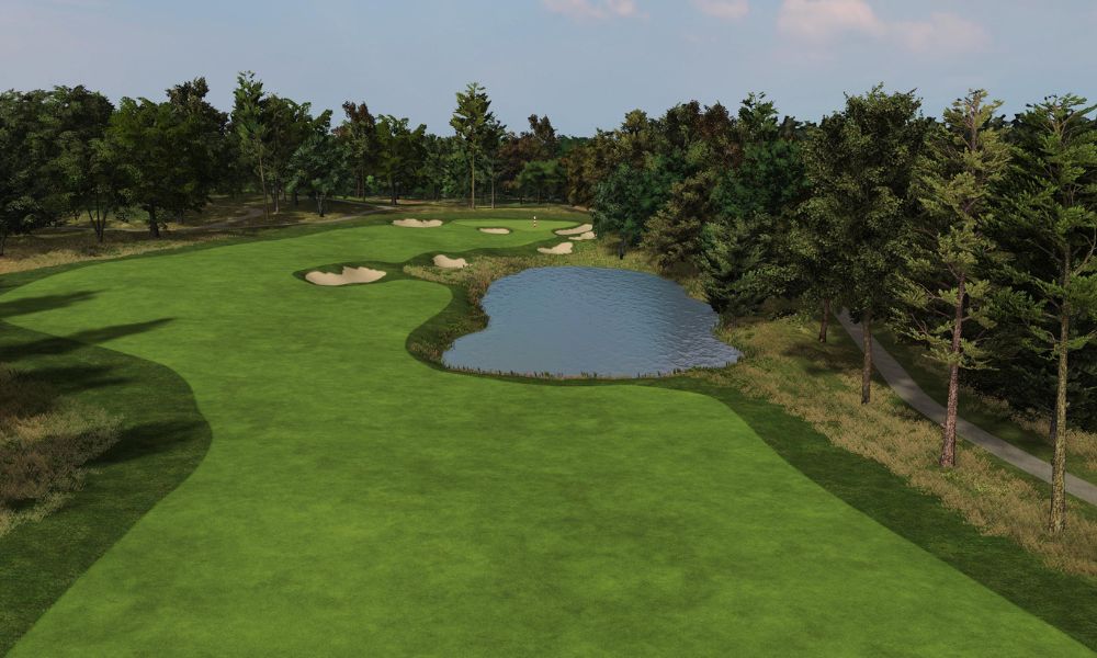 Golf course with green grass, trees, and a pond