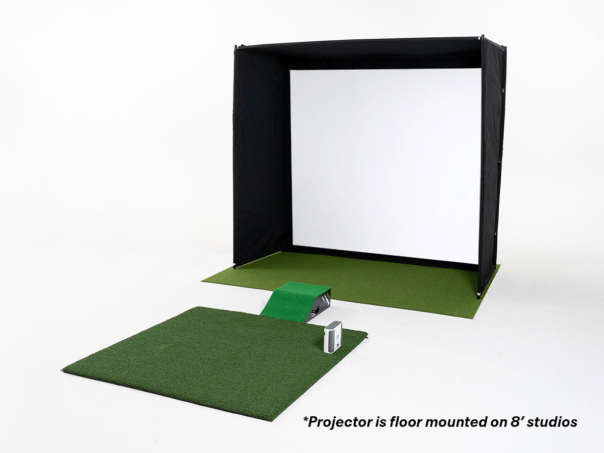 Golf simulator setup with green mat, projector, and screen on a white background
