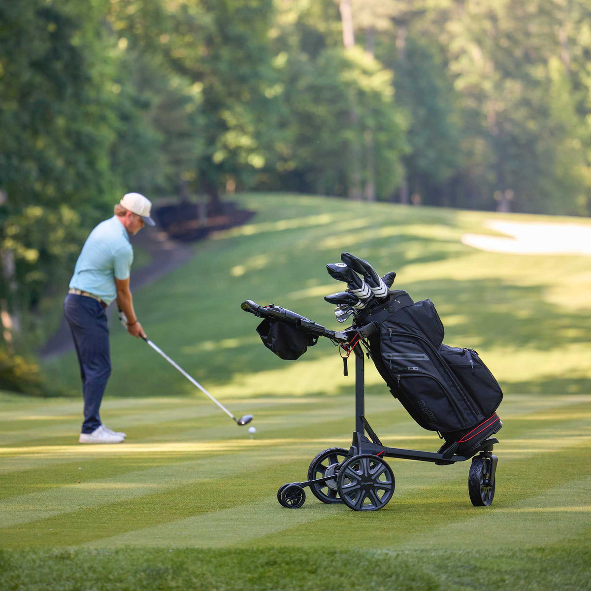 Bag Boy Volt golf cart, new 4th wheel design, lifestyle photo