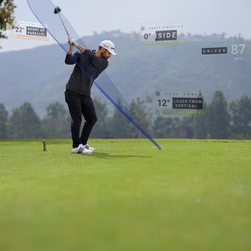 SKYTRAK mobile application interface mapping top of backswing transition telemetry, measuring shaft orientation lines, backswing length arcs, and club velocity metrics.